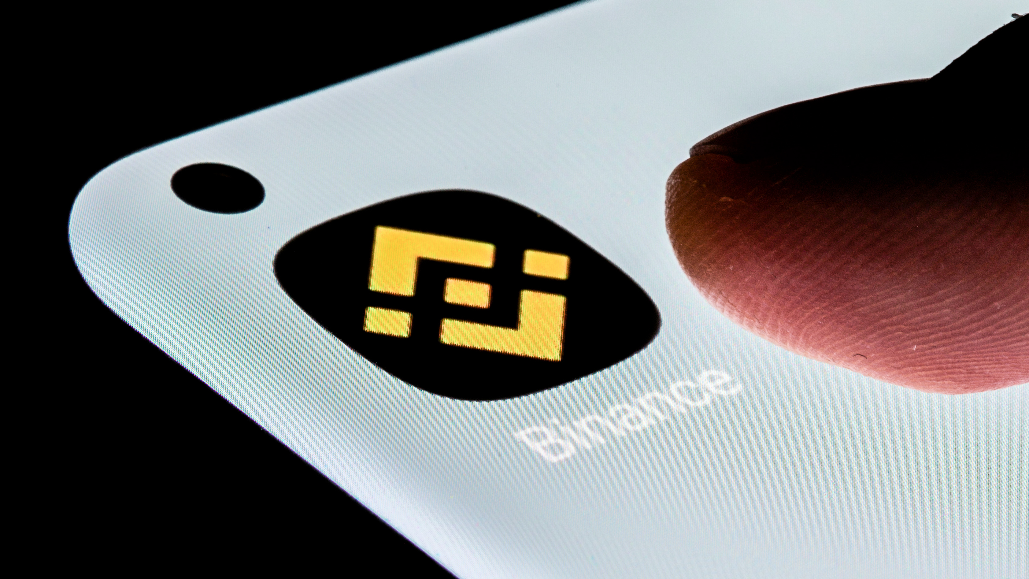 Crypto exchange Binance bows to pressure for physical headquarters - Nikkei  Asia