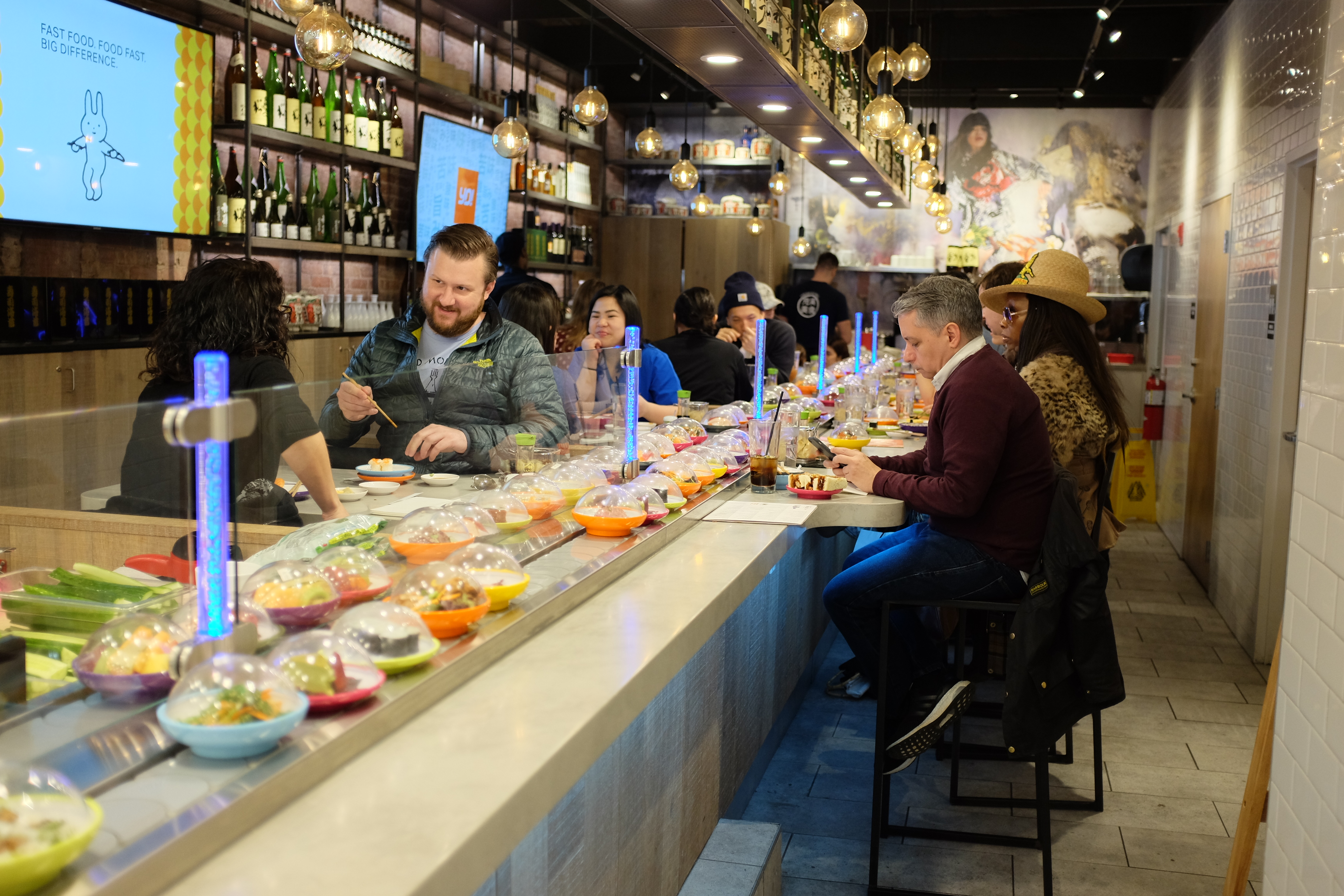 Conveyor-belt sushi rolls again in New York Nikkei Asia