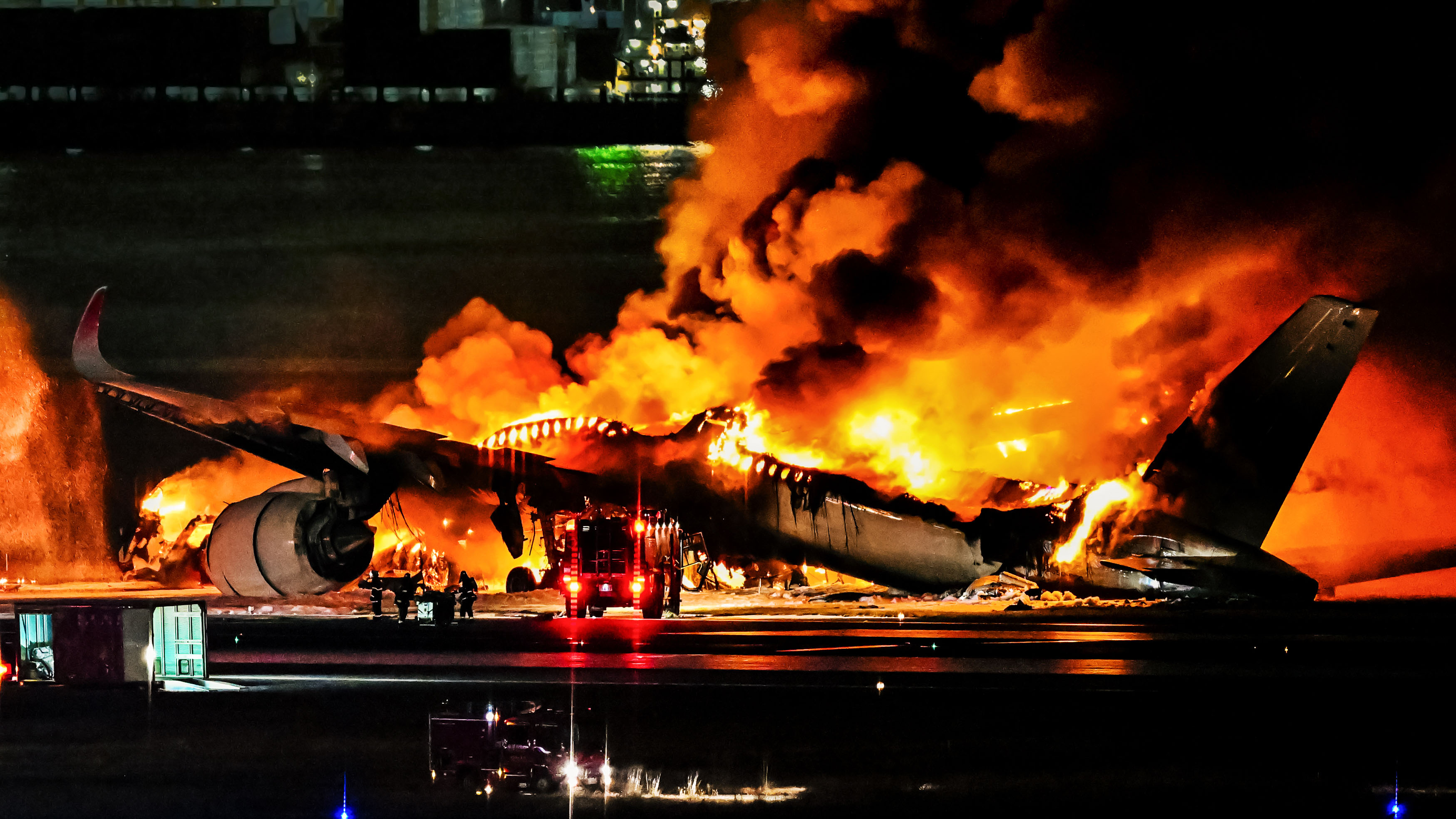 Japan Airlines plane burns up at Tokyo airport after collision