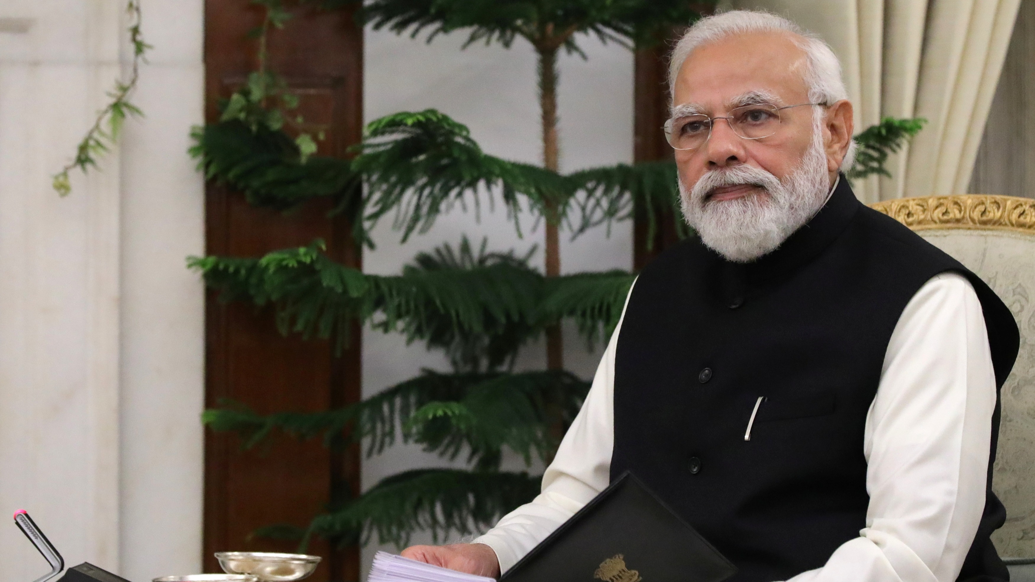 Modi's party retains control of India's key battleground state